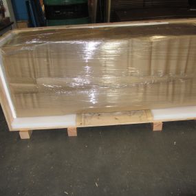 Items are boxed, wrapped and packed inside the crate.