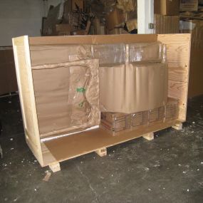After being wrapped they are consolidated inside a wooden crate or reinforced box.