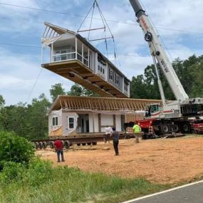 House being set with crane