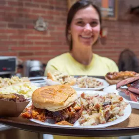 Wurst staff serving food