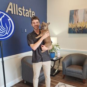 Our Licensed Sales Professional Jake with Milo, his adorable dog, on “Bring Your Pet to Work Day”!