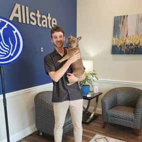 Our Licensed Sales Professional Jake with Milo, his adorable dog, on “Bring Your Pet to Work Day”!