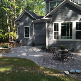 Chapel Hill patio with outdoor fire pit and outdoor kitchen.