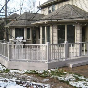 New Azek deck and railing, with composite gate in Ft Wayne, IN.  New Belgard paver patio.