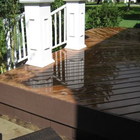 New thermo-wood deck, with Azek trim in Fort Wayne.  Custom newel posts for Azek stair railing.