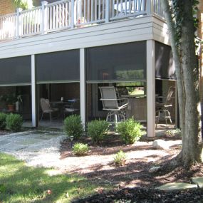 Fly-Away retractable screen installation under existing deck in Fort Wayne.