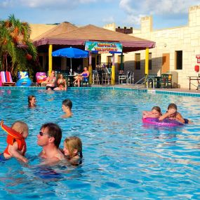 Make a splash in one of two Olympic-style pools at Seralago Hotel & Suites near Disney World.