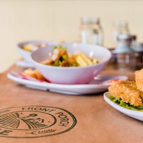 Experience great southern cooking at Front Porch Cafe.