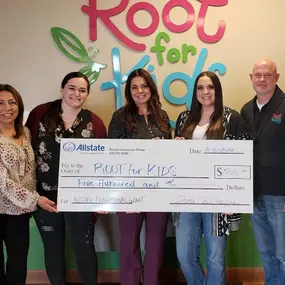 The Agency Helping Hands Grant to Root for Kids.