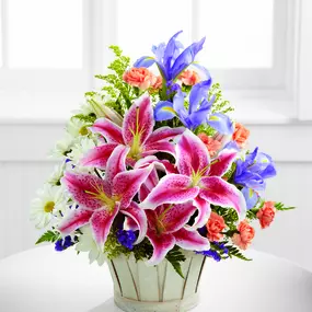 Looking for the best lily flower bouquet for your loved ones? The Wondrous Nature Bouquet is crafted by expert florist in Coshocton with an aesthetic appeal for any special occasions. This beautiful bouquet also features daisies and carnations. Order online from [Shop name in City] with ease.