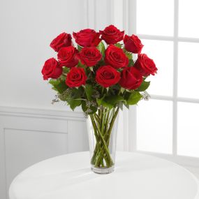 This timeless red bouquet will make a statement for your special someone. Red flowers are an elegant, iconic and romantic gift for anyone close to your heart. Each flower arrangement is handcrafted and hand delivered to say I Love You!
