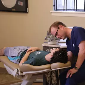 Houston Orthodontist Dr. Brad Jennings doing what he does best.  Helping his patients get a rockin' smile!