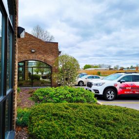 Green Bay personal injury law office building and the Hupy and Abraham car.