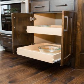 At McChesney Cabinets, our team can modify any design to accommodate the most specific needs including pop up mixer stands, recycling roll outs, built in spice racks, and much more.