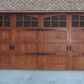 Austin, Texas wood garage door installation and wood garage door repair.
