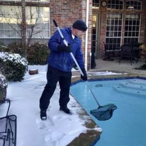 Pool Troopers Service Technician Working in the Snow
