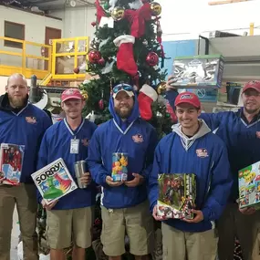 Pool Troopers Staff Participating in Toys for Tots