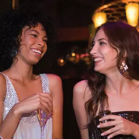 Two women at nightlife at Juno Bar in Caesars Southern Indiana.