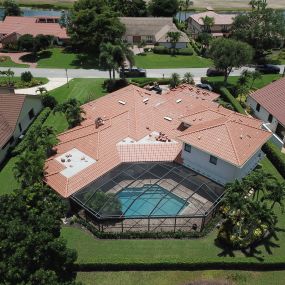 Aerial view of a home with a pool.