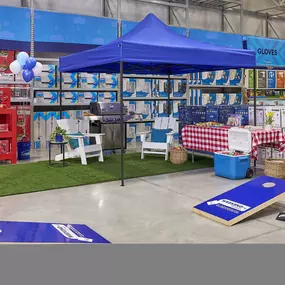 Lowe's employee providing a quote to a customer.