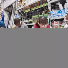 Lowe's store team gathering for a team meeting.