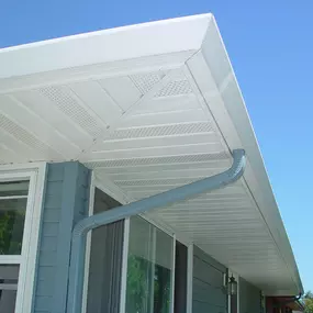 A well-designed gutter system will reduce and eliminate water and ice issues around your home surfaces, greenery and foundation by carrying the rain water away for manageable drainage. ABC Seamless Siding, Gutters and Windows can match and cover your overhang to eliminate difficult painting and upgrade your home's appearance.