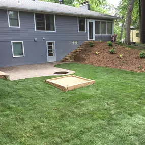 Some of the CB Services Lawn, Landscape and Irrigation landscaping options include retaining walls, sidewalks, paver patios, outdoor living spaces, outdoor fire pits, outdoor kitchens, boulder walls, and rock or mulch installation.