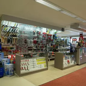De gereedschapwand en kassa