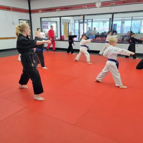 Young martial artists learn discipline, focus, and respect while having a blast