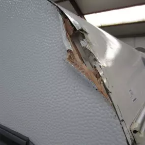 dakschade en zijwand schade