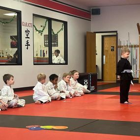 Congrats to our Master Club Mighty Leland!! He earned his black stripe AND modeled Tournament moves for his fellow Mighties and parents!