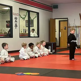 Congrats to our Master Club Mighty Leland!! He earned his black stripe AND modeled Tournament moves for his fellow Mighties and parents!