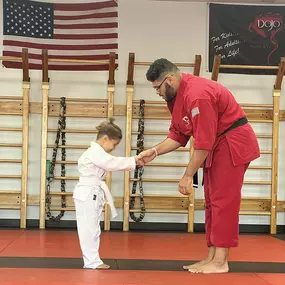 Our newest Mighty Tiger, Leon, showing off his punches and earning his White Belt!