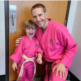 In October we wear pink! Don't forget to order your pink uniforms and belts to support Cancer Warriors.