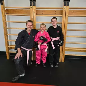 Pink Belts and uniforms. Order them in the office now to show support for Cancer Warriors!