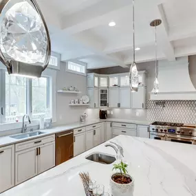 White and dark can bring out the light of the kitchen.