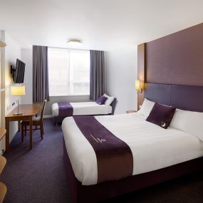 Premier Inn twin room with double bed, single sofa bed and flat screen TV