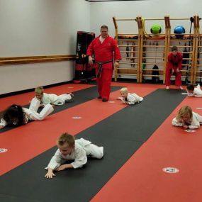 Animal crawl relays at Dojo Karate. Contact us to get more information about Dojo Karate!