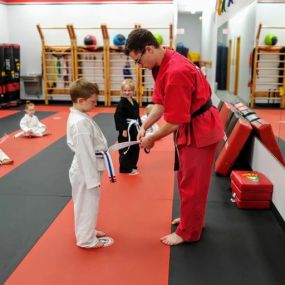 Martial arts instruction requires students to pursue goals to earn new belts. Young kids can easily become frustrated when they don’t get what they want, but studying martial arts helps them learn the power of persistence.

The physical activity in our classes also helps kids manage stress and anxiety by allowing them to burn it off in a safe and constructive way.