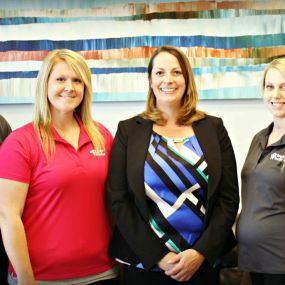 Our dentist, Dr. Lori Logsdon, DDS with the staff at Bright Smiles Dental.