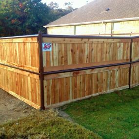 Wood and metal combination fence