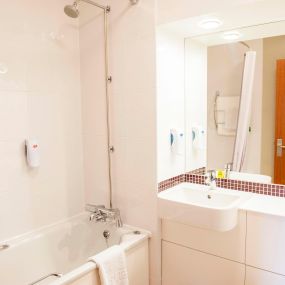 Premier Inn bathroom with bath and shower