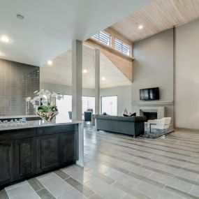 Spacious Living Room with plank flooring