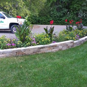 Add style and support to your landscaping design with custom retaining and freestanding walls from Designing Nature. Retaining walls can complement new or existing hardscape structures or stand on their own while providing beauty or purpose.