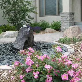 Upgrade your outdoor space with the beauty and resilience of stone. At Designing Nature Landscaping Services, our team can help your repair and install a variety of different stone features including patios, driveways, retaining walls, and much more.