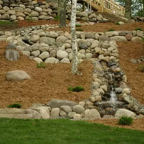 Our team adds beauty to drainage culverts and ditches, edging these natural creek beds with plants or shrubs and lining them with durable, attractive stones.