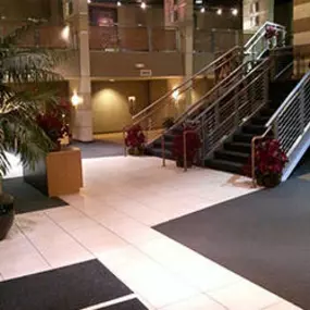 Dallas Janitorial Services professionally cleaned this modern building entryway, resulting in spotless floors and sanitized surfaces. The pristine entrance creates a positive first impression for visitors and employees alike.