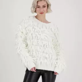 Fun fall sweaters with fringe and feathers