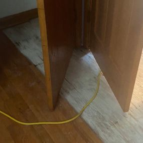 Pictured here is water damage in a Minneapolis bedroom closet.