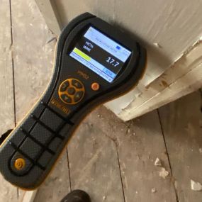 Pictured here is a moisture meter for Minneapolis water damage.  We use a moisture meter to detect water behind walls.  As you can see, this area of drywall is 17% wet.